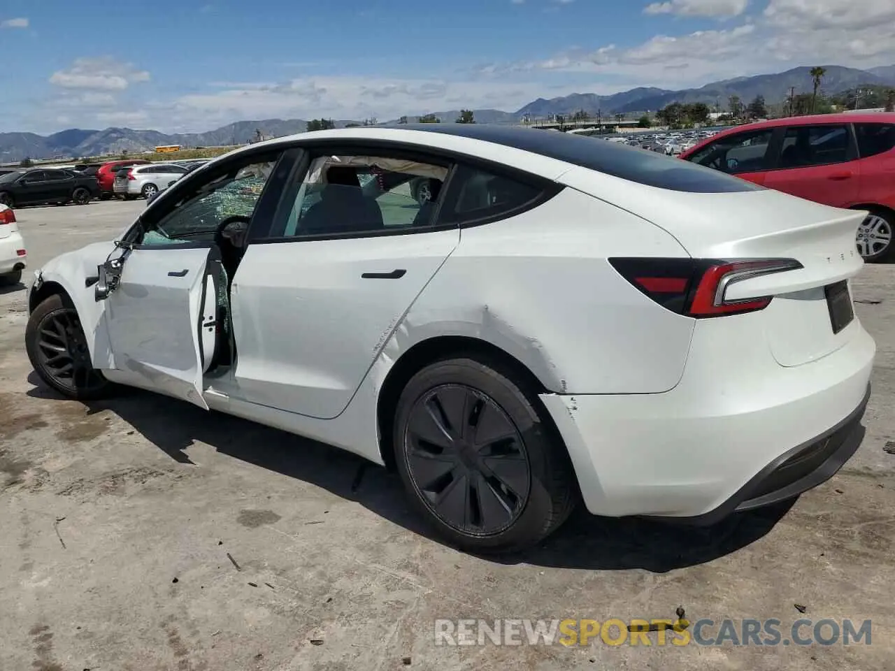 2 Photograph of a damaged car 5YJ3E1EB4RF811734 TESLA MODEL 3 2024