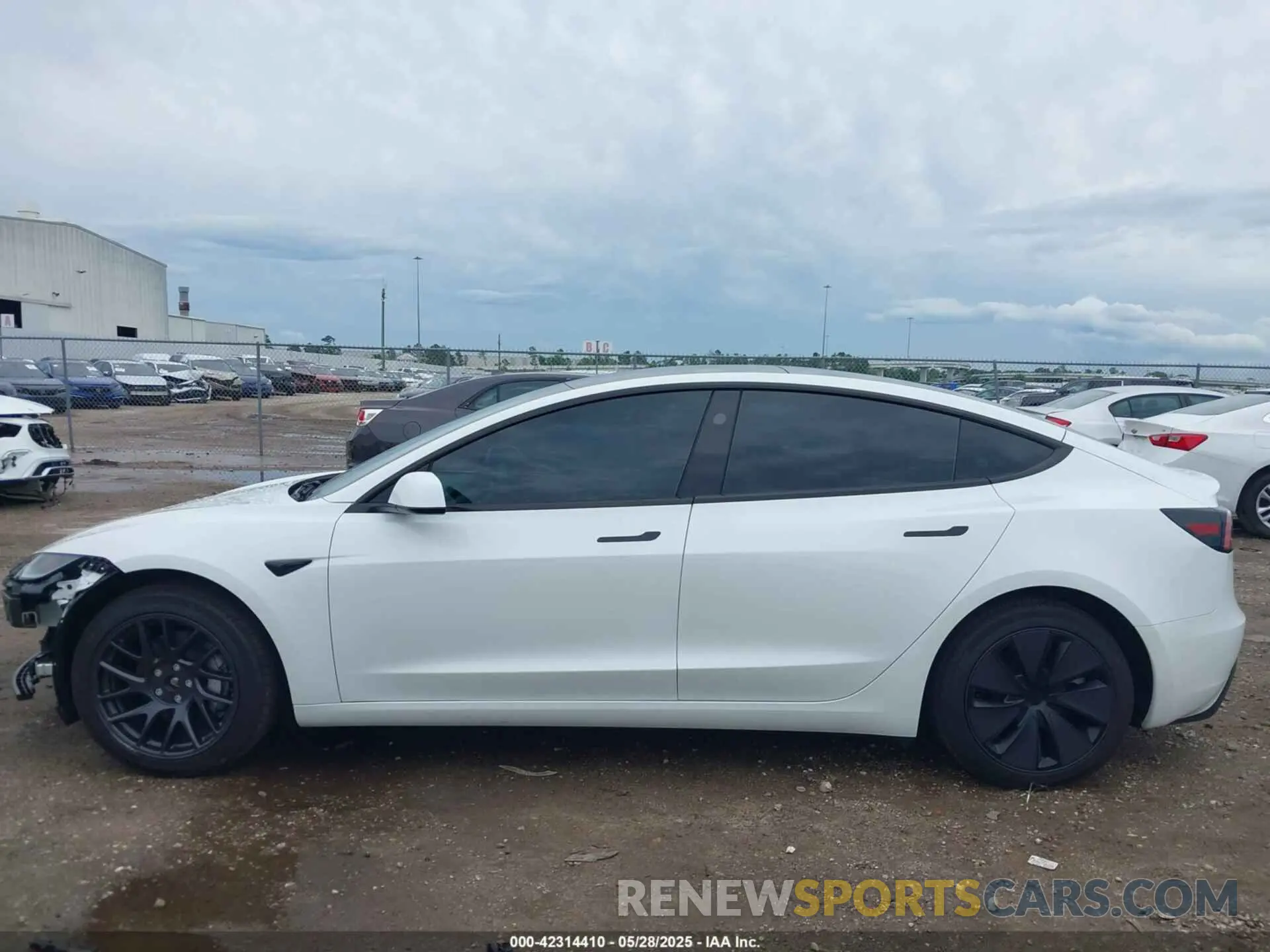 14 Photograph of a damaged car 5YJ3E1EBXRF770011 TESLA MODEL 3 2024