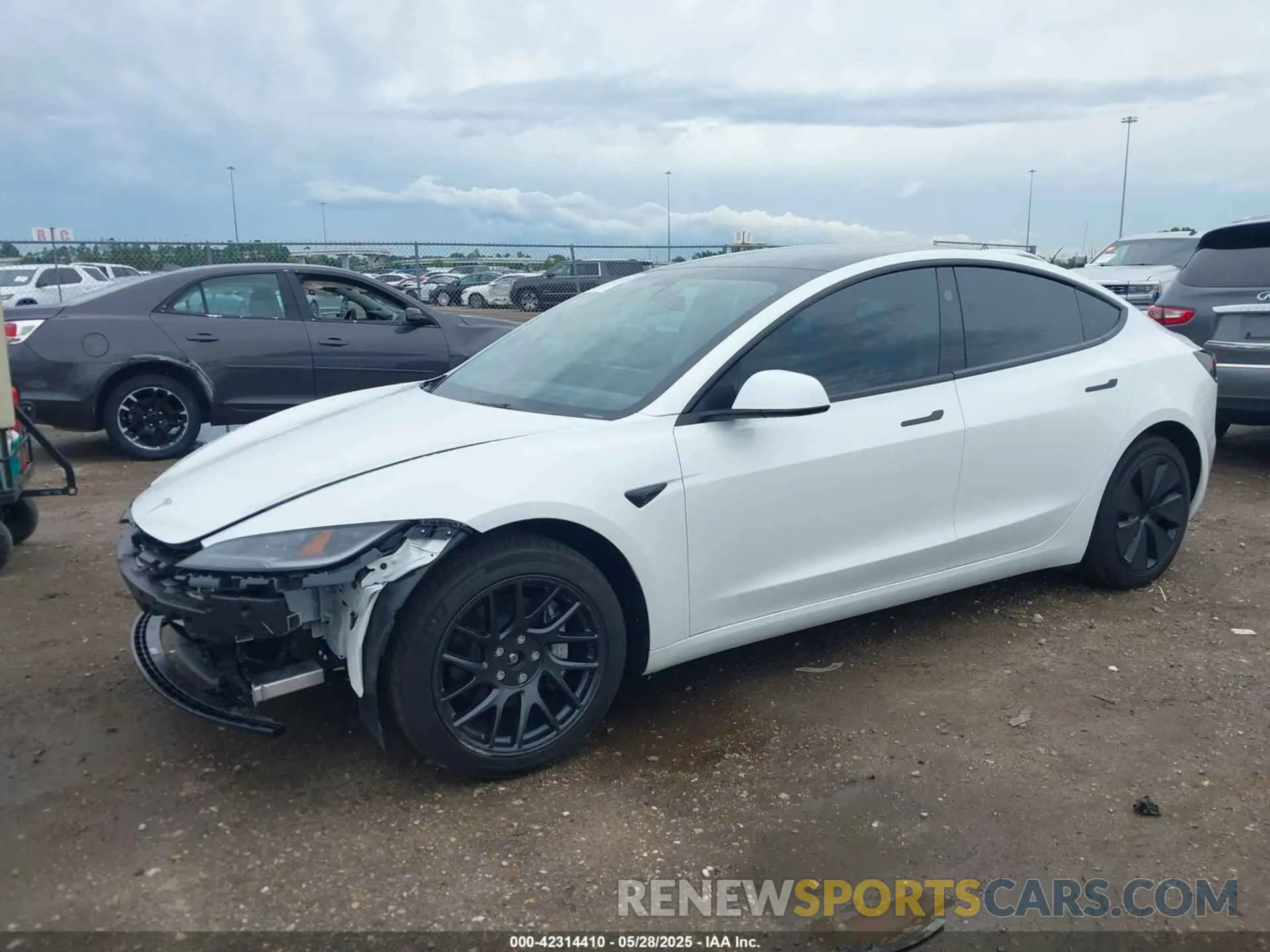 2 Photograph of a damaged car 5YJ3E1EBXRF770011 TESLA MODEL 3 2024