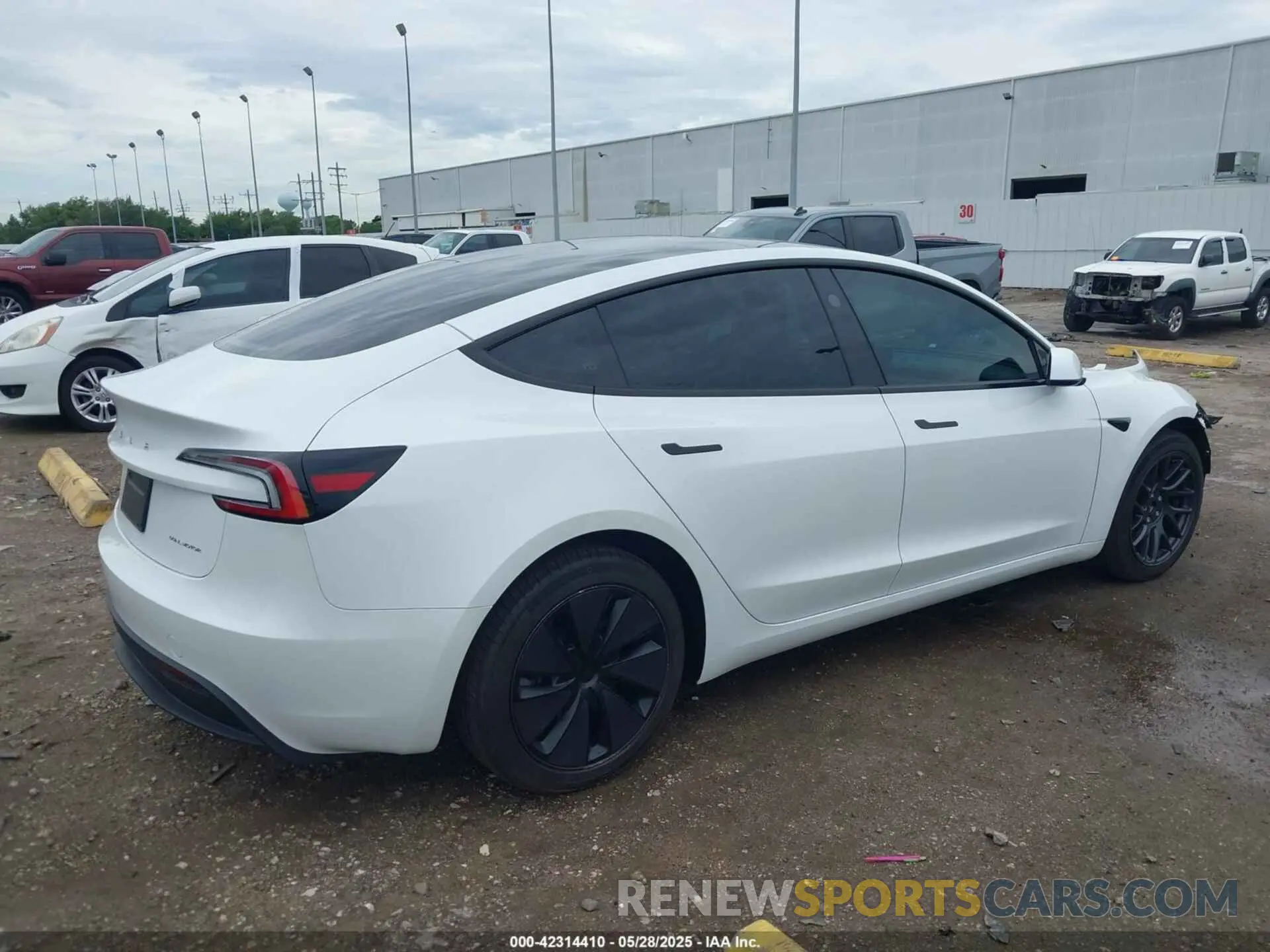 4 Photograph of a damaged car 5YJ3E1EBXRF770011 TESLA MODEL 3 2024