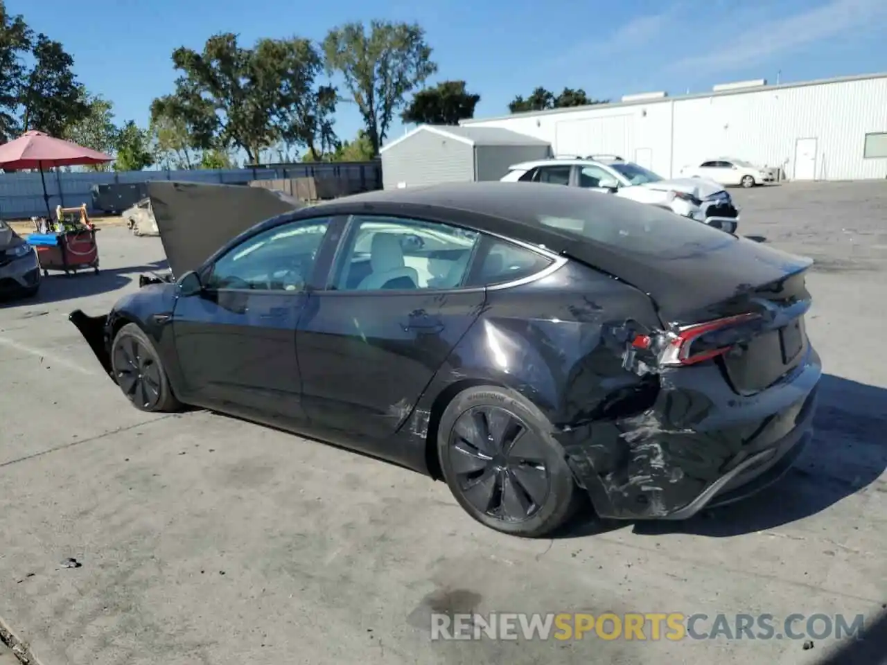 2 Photograph of a damaged car 5YJ3E1EBXRF809860 TESLA MODEL 3 2024