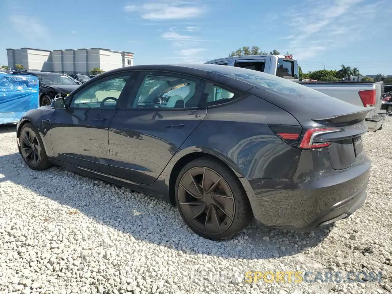 2 Photograph of a damaged car 5YJ3E1ET3RF836570 TESLA MODEL 3 2024