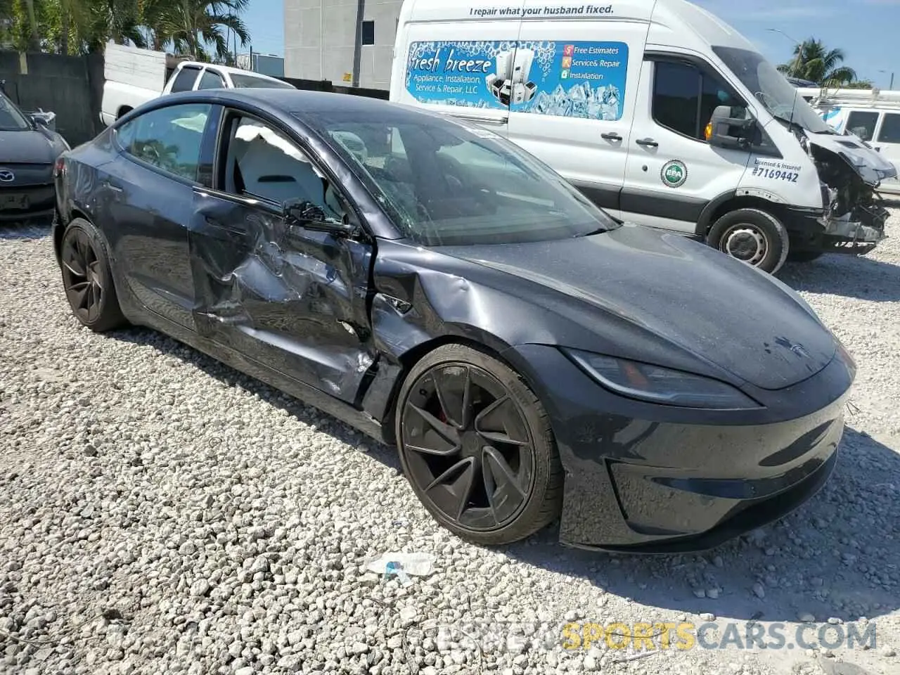 4 Photograph of a damaged car 5YJ3E1ET3RF836570 TESLA MODEL 3 2024