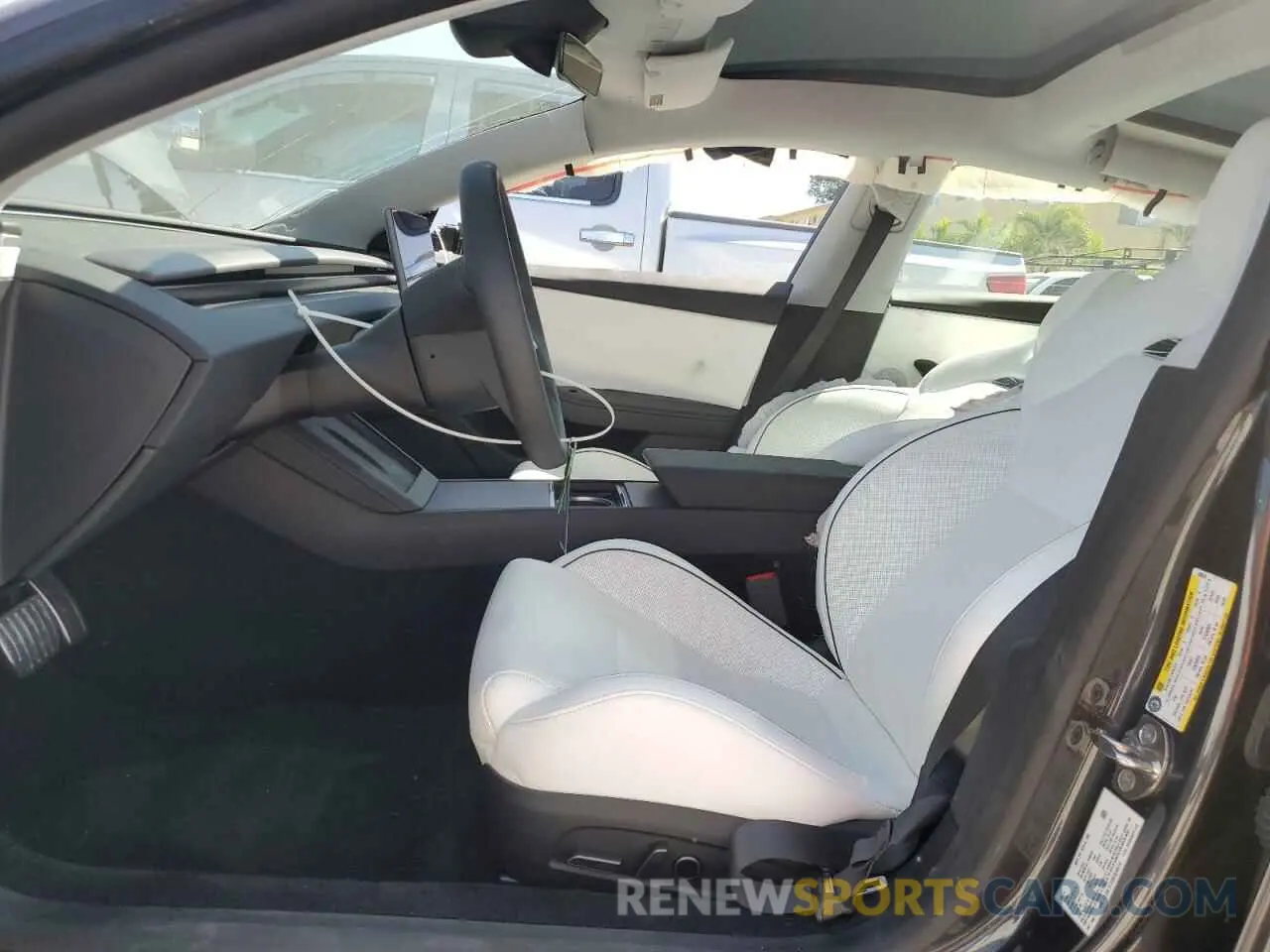 7 Photograph of a damaged car 5YJ3E1ET3RF836570 TESLA MODEL 3 2024