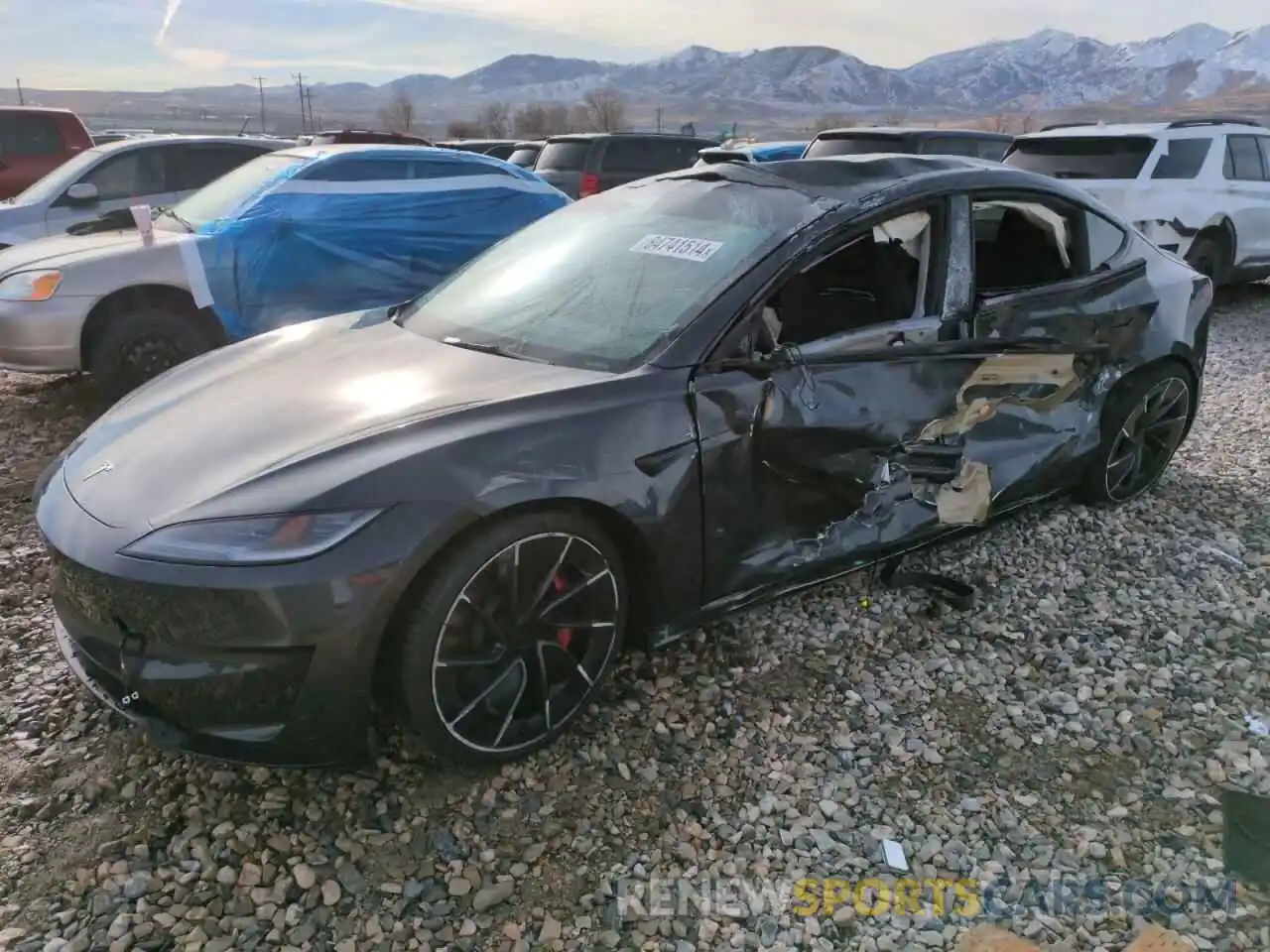 1 Photograph of a damaged car 5YJ3E1ET4RF820894 TESLA MODEL 3 2024