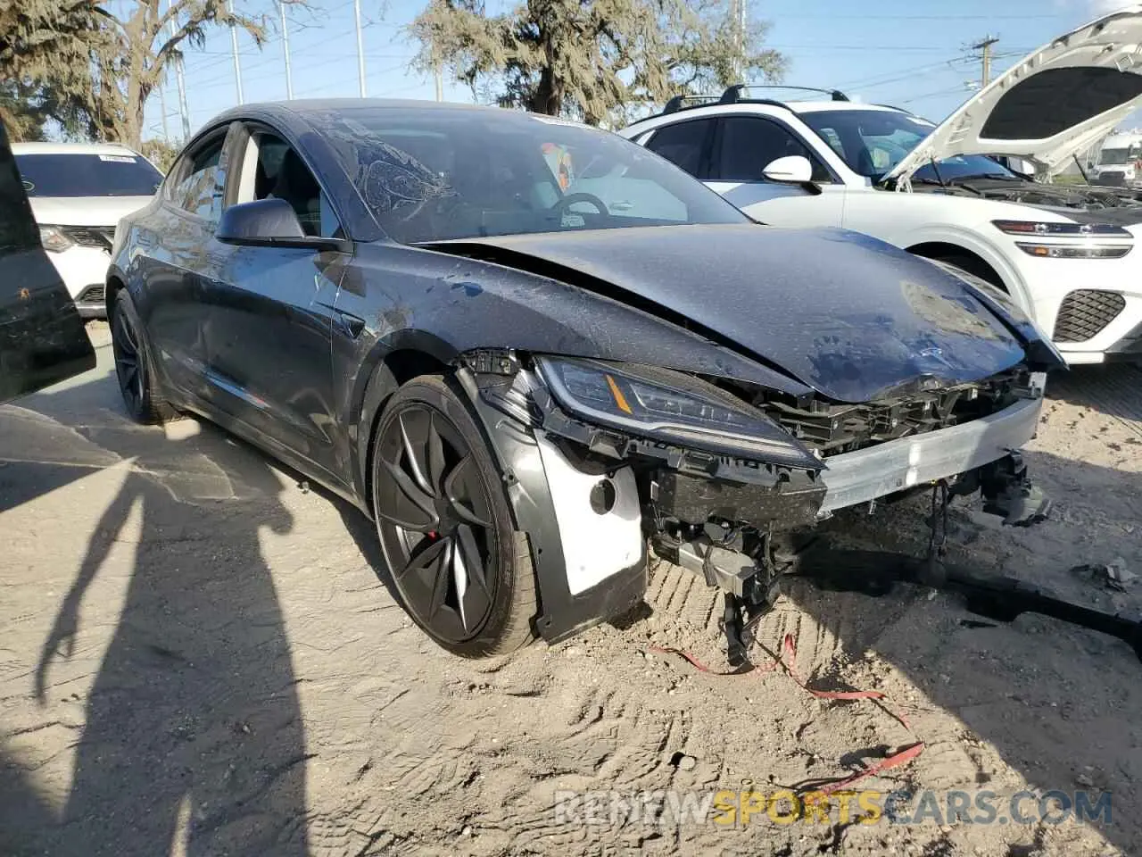 4 Photograph of a damaged car 5YJ3E1ET4RF826212 TESLA MODEL 3 2024
