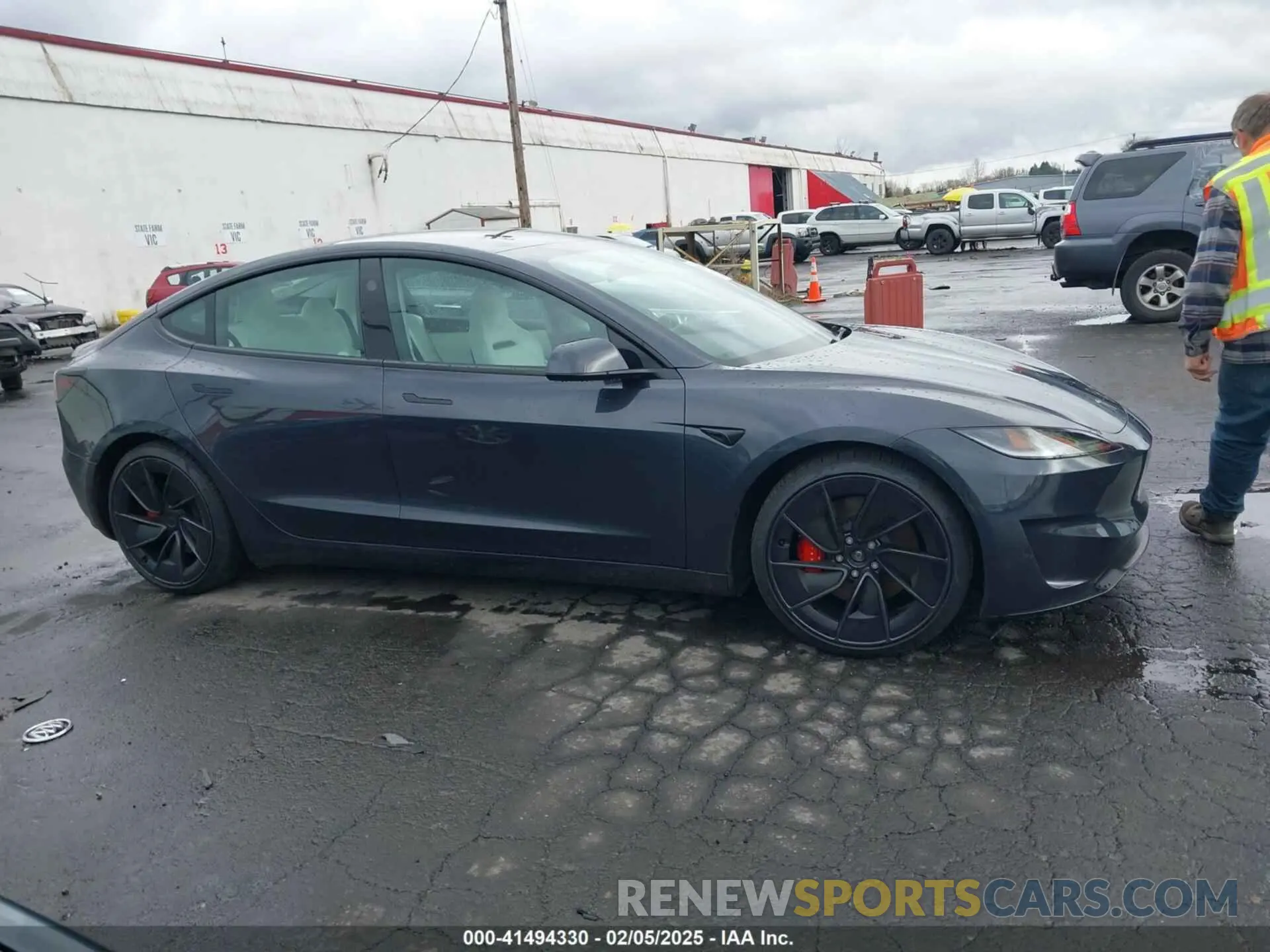 12 Photograph of a damaged car 5YJ3E1ET4RF870856 TESLA MODEL 3 2024