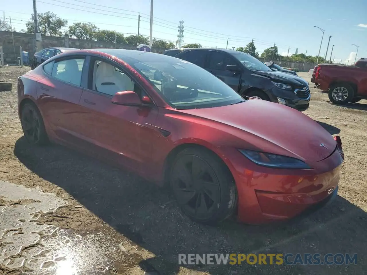 4 Photograph of a damaged car 5YJ3E1ET5RF769597 TESLA MODEL 3 2024