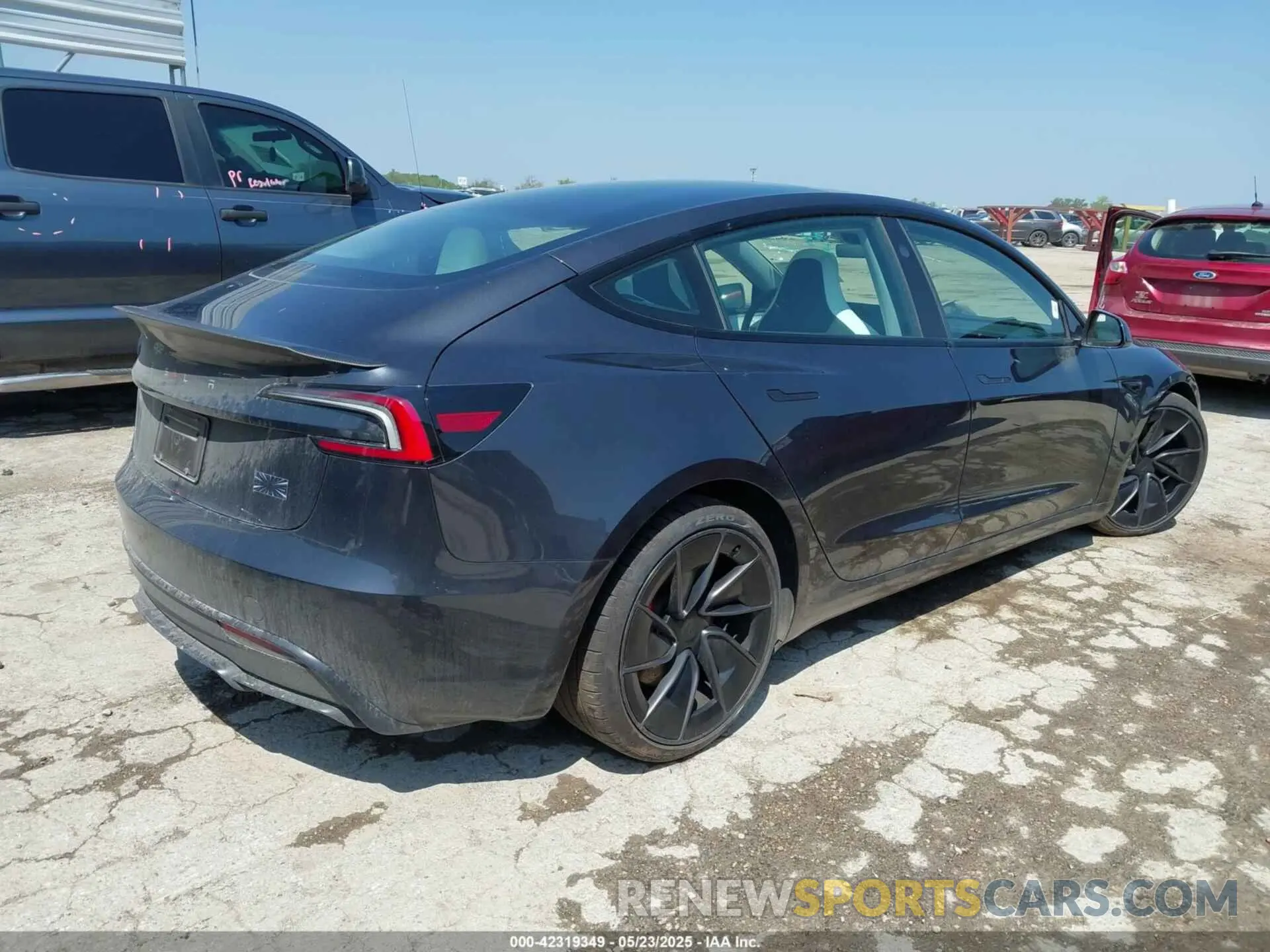 4 Photograph of a damaged car 5YJ3E1ET6RF869014 TESLA MODEL 3 2024