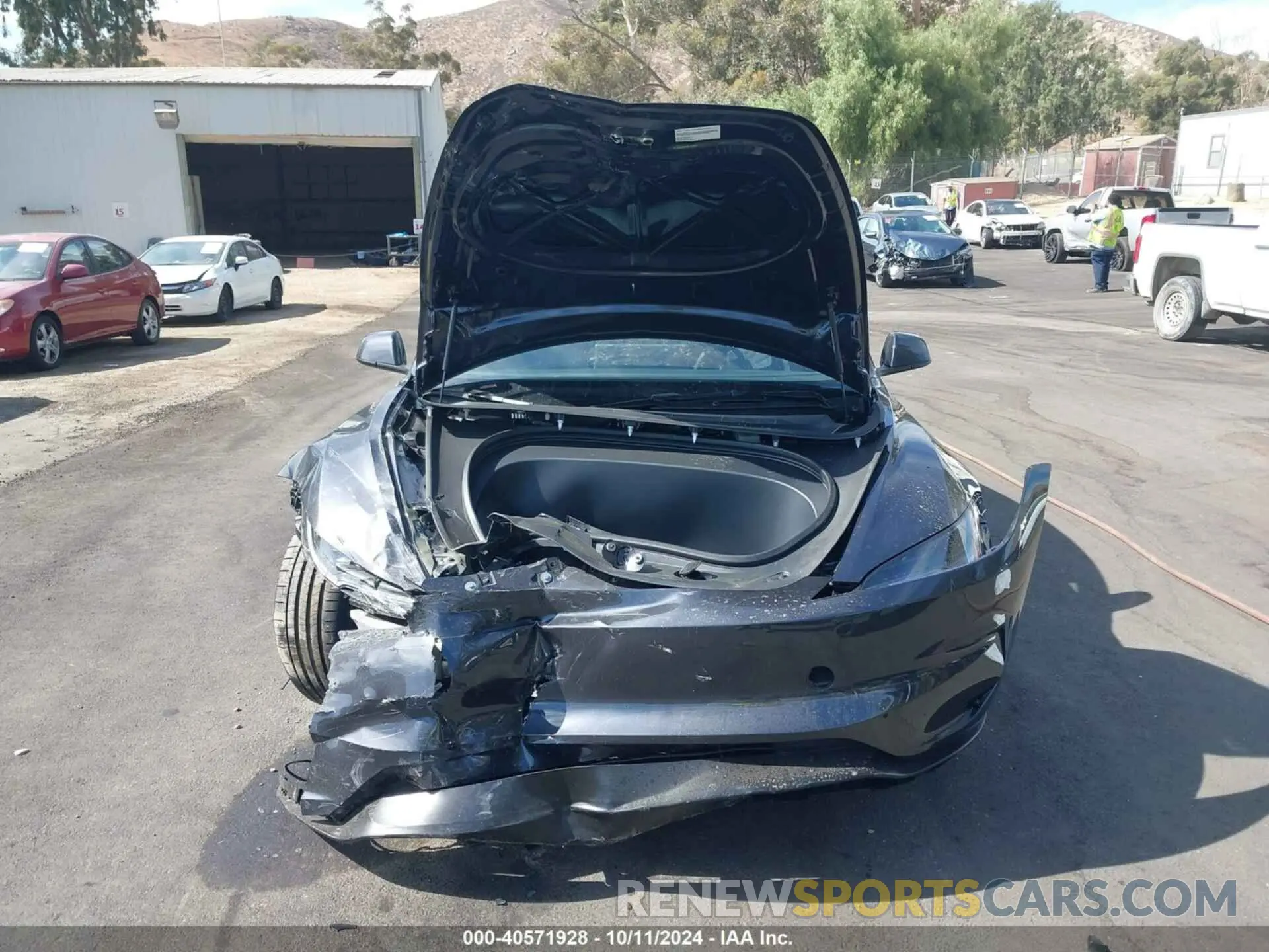 12 Photograph of a damaged car 5YJ3E1ET6RF871829 TESLA MODEL 3 2024