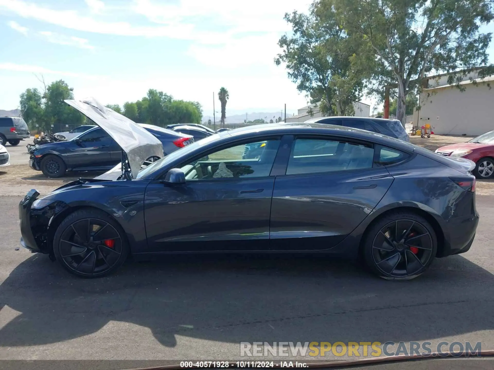 14 Photograph of a damaged car 5YJ3E1ET6RF871829 TESLA MODEL 3 2024