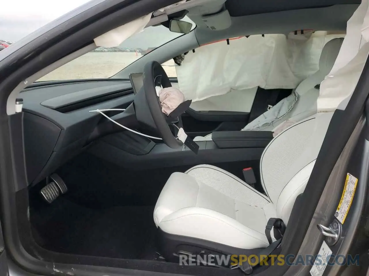 7 Photograph of a damaged car 5YJ3E1ET7RF868860 TESLA MODEL 3 2024