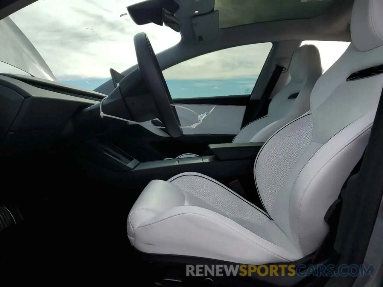 7 Photograph of a damaged car 5YJ3E1ET8RF849654 TESLA MODEL 3 2024