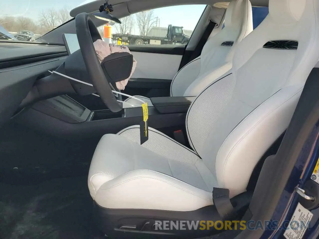 7 Photograph of a damaged car 5YJ3E1ET9RF853227 TESLA MODEL 3 2024