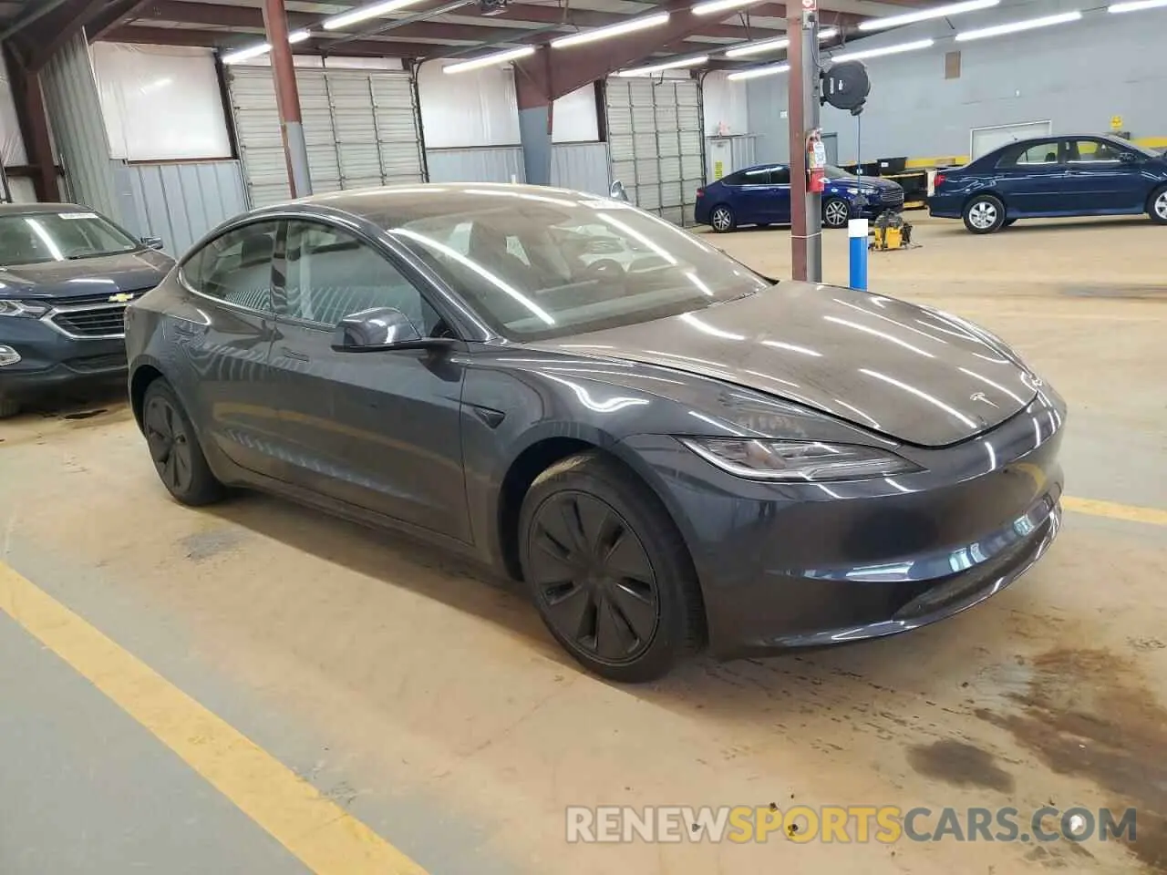 4 Photograph of a damaged car 5YJ3E1EA2SF930959 TESLA MODEL 3 2025
