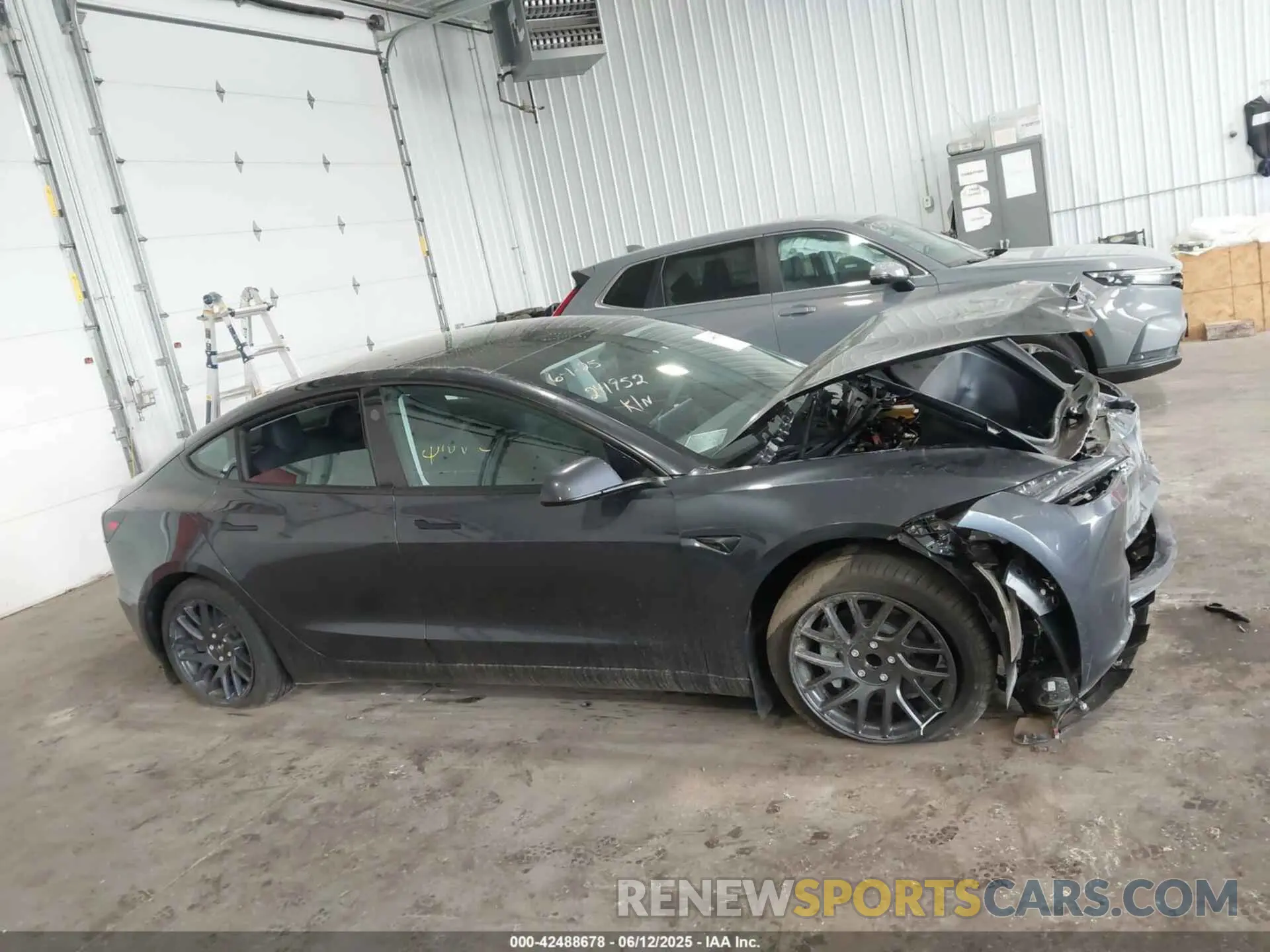 12 Photograph of a damaged car 5YJ3E1EA4SF007401 TESLA MODEL 3 2025