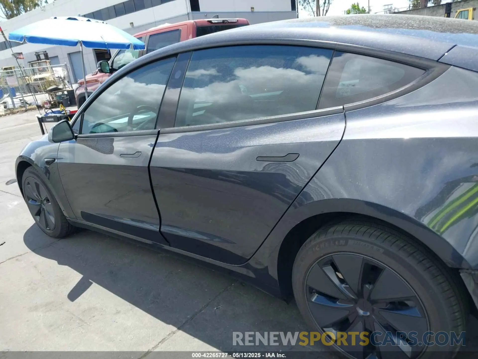 14 Photograph of a damaged car 5YJ3E1EA5SF915047 TESLA MODEL 3 2025