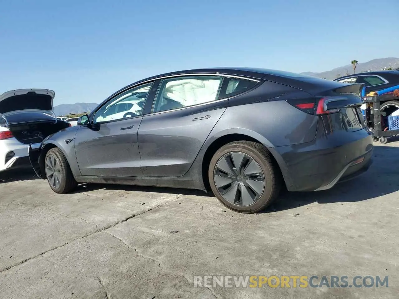 2 Photograph of a damaged car 5YJ3E1EA6SF895973 TESLA MODEL 3 2025