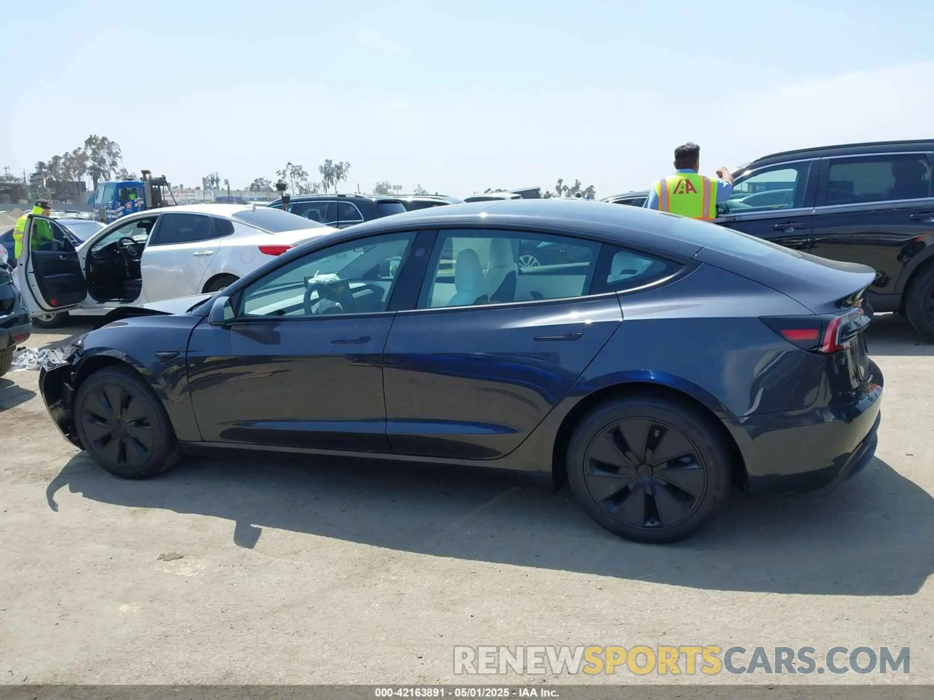 14 Photograph of a damaged car 5YJ3E1EAXSF983053 TESLA MODEL 3 2025