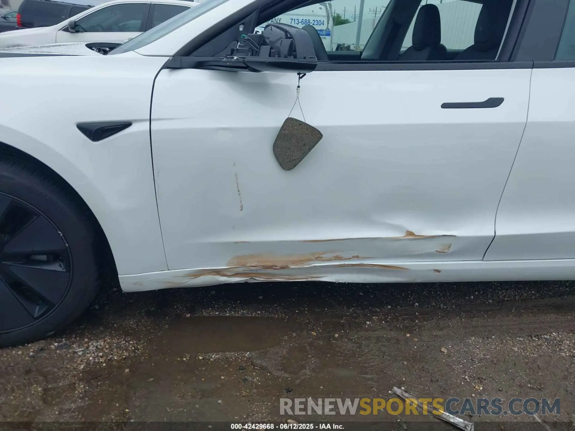 20 Photograph of a damaged car 5YJ3E1EB1SF932212 TESLA MODEL 3 2025