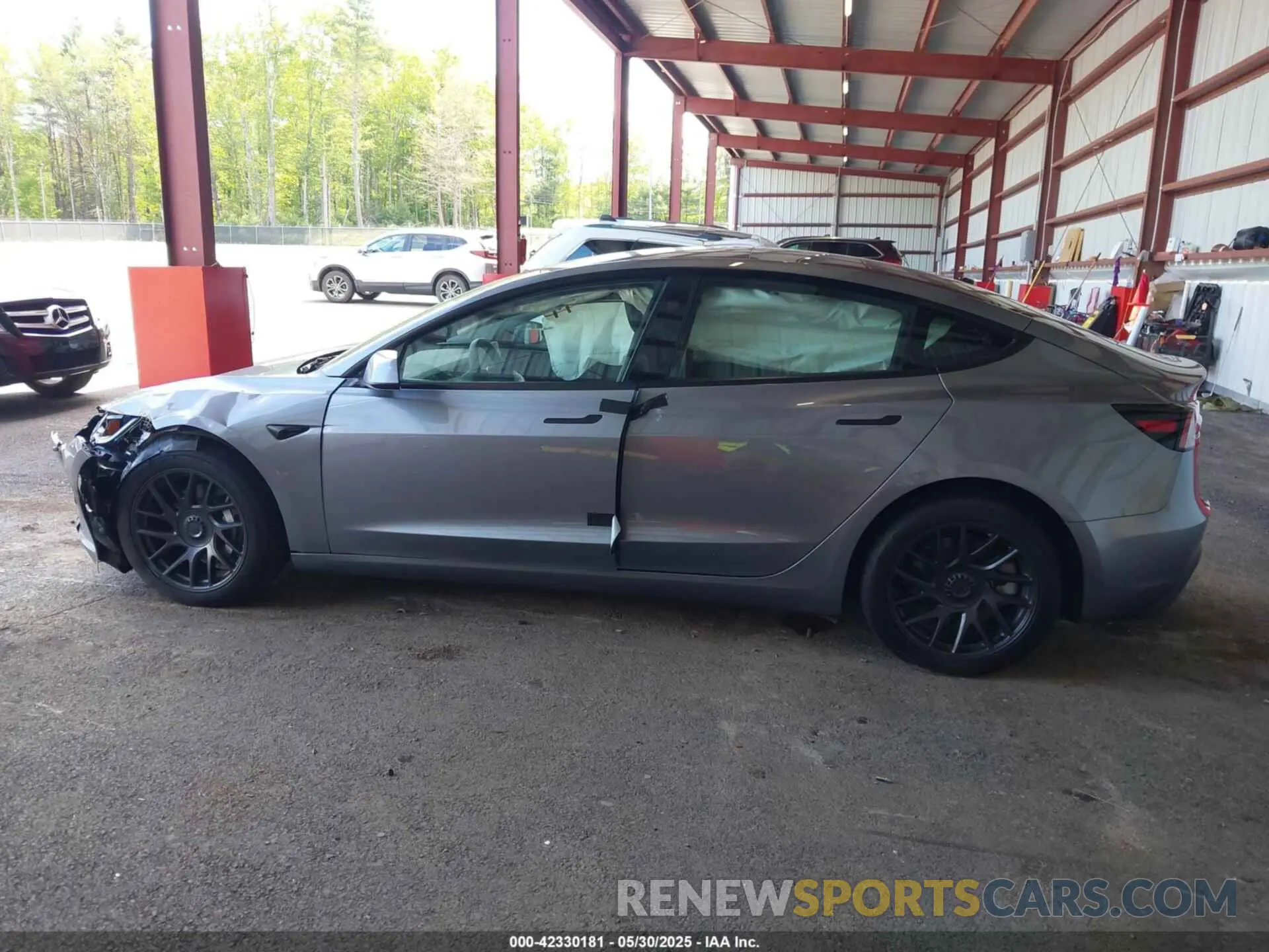 13 Photograph of a damaged car 5YJ3E1EB4SF943771 TESLA MODEL 3 2025