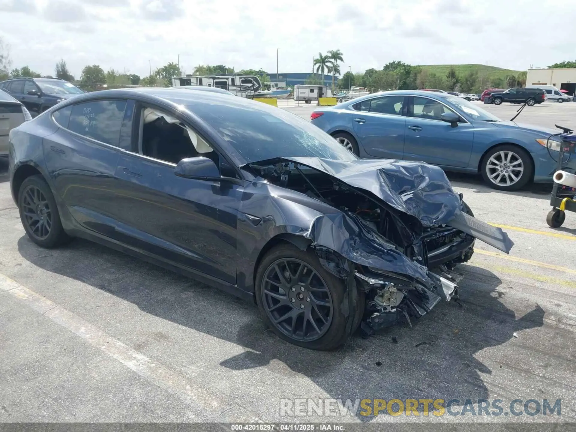 1 Photograph of a damaged car 5YJ3E1EBXSF909124 TESLA MODEL 3 2025