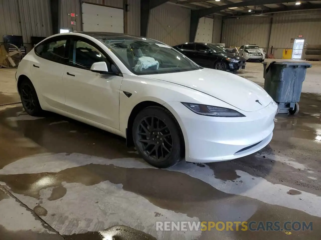 4 Photograph of a damaged car 5YJ3E1EBXSF942561 TESLA MODEL 3 2025