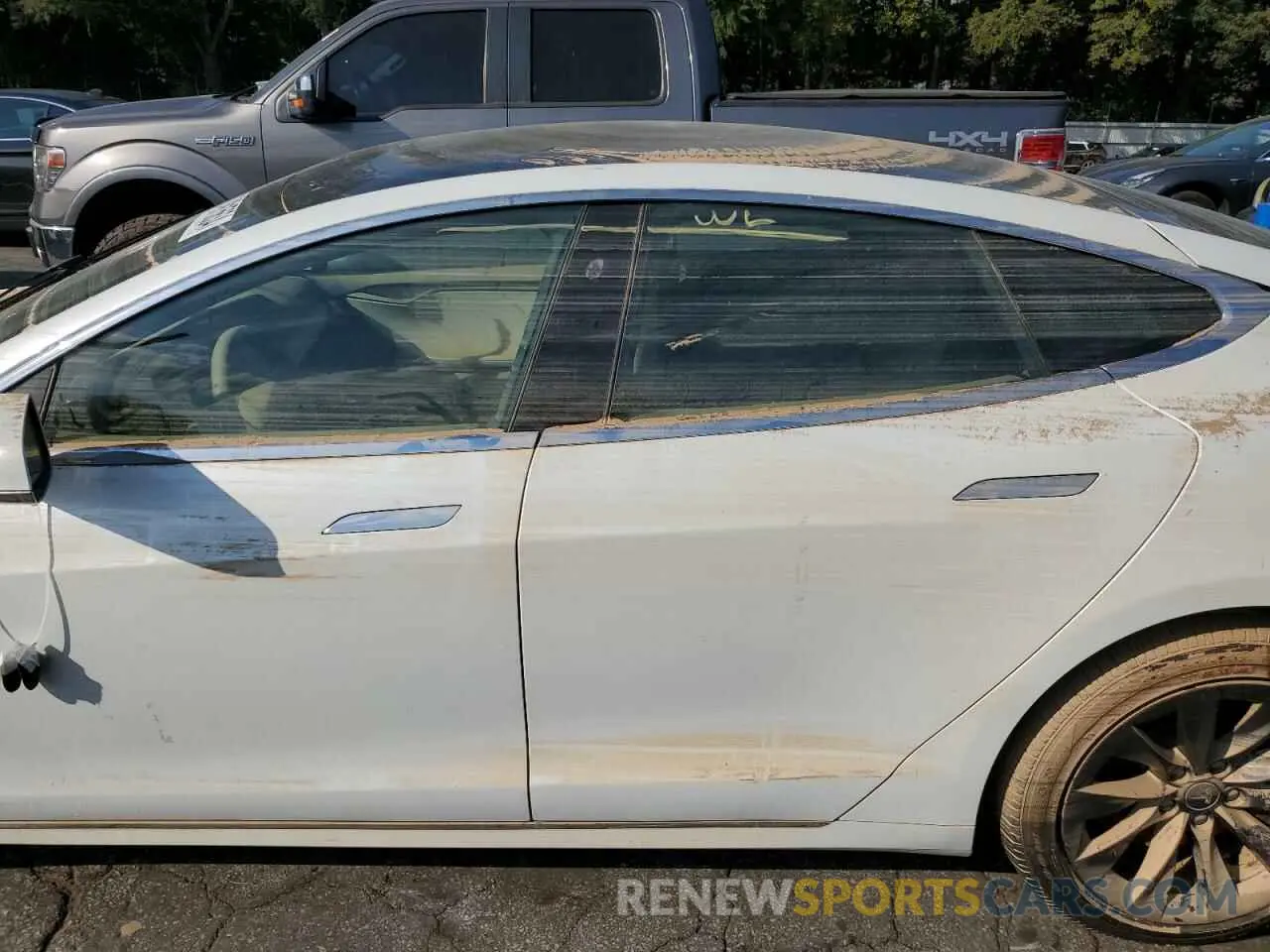 12 Photograph of a damaged car 5YJSA1E22LF360575 TESLA MODEL S 2020