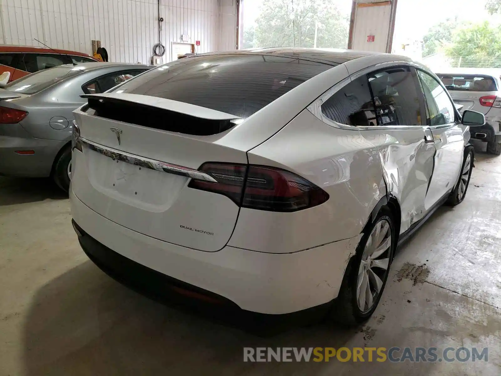 4 Photograph of a damaged car 5YJXCBE20LF249500 TESLA MODEL S 2020