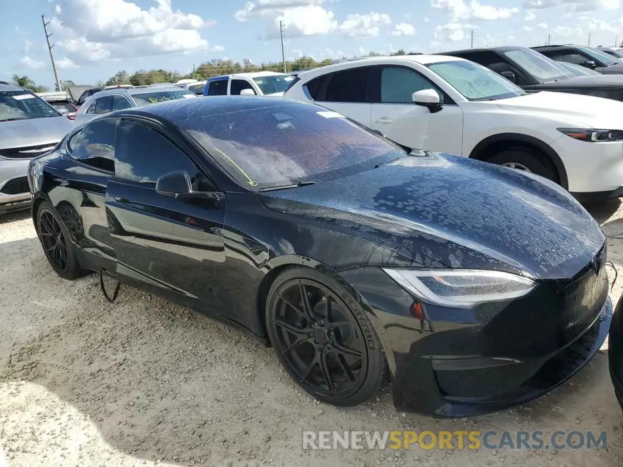 4 Photograph of a damaged car 5YJSA1E65NF458683 TESLA MODEL S 2022