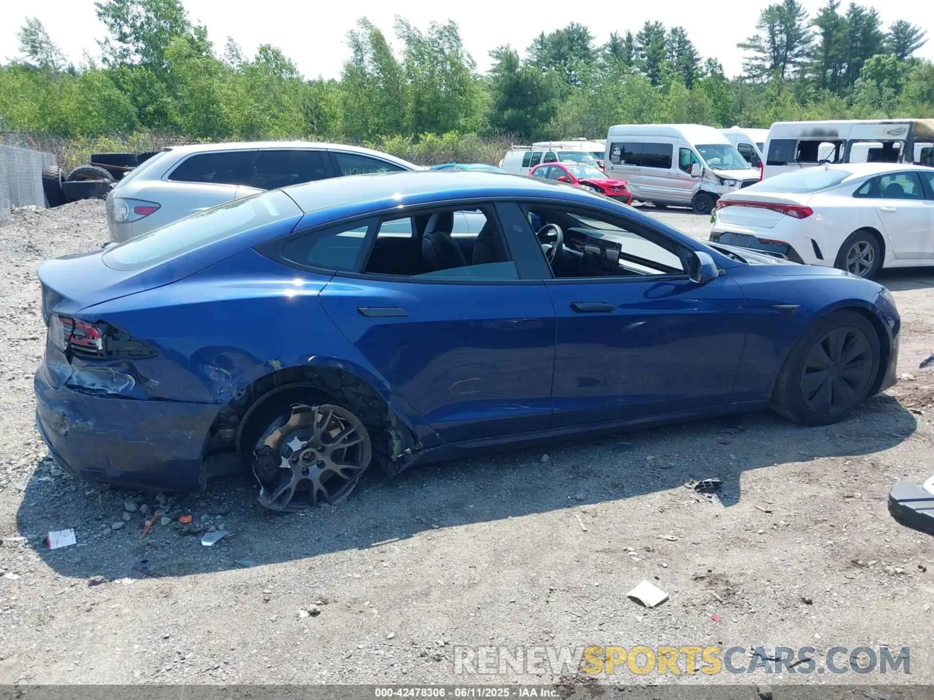 13 Photograph of a damaged car 5YJSA1E51PF530604 TESLA MODEL S 2023