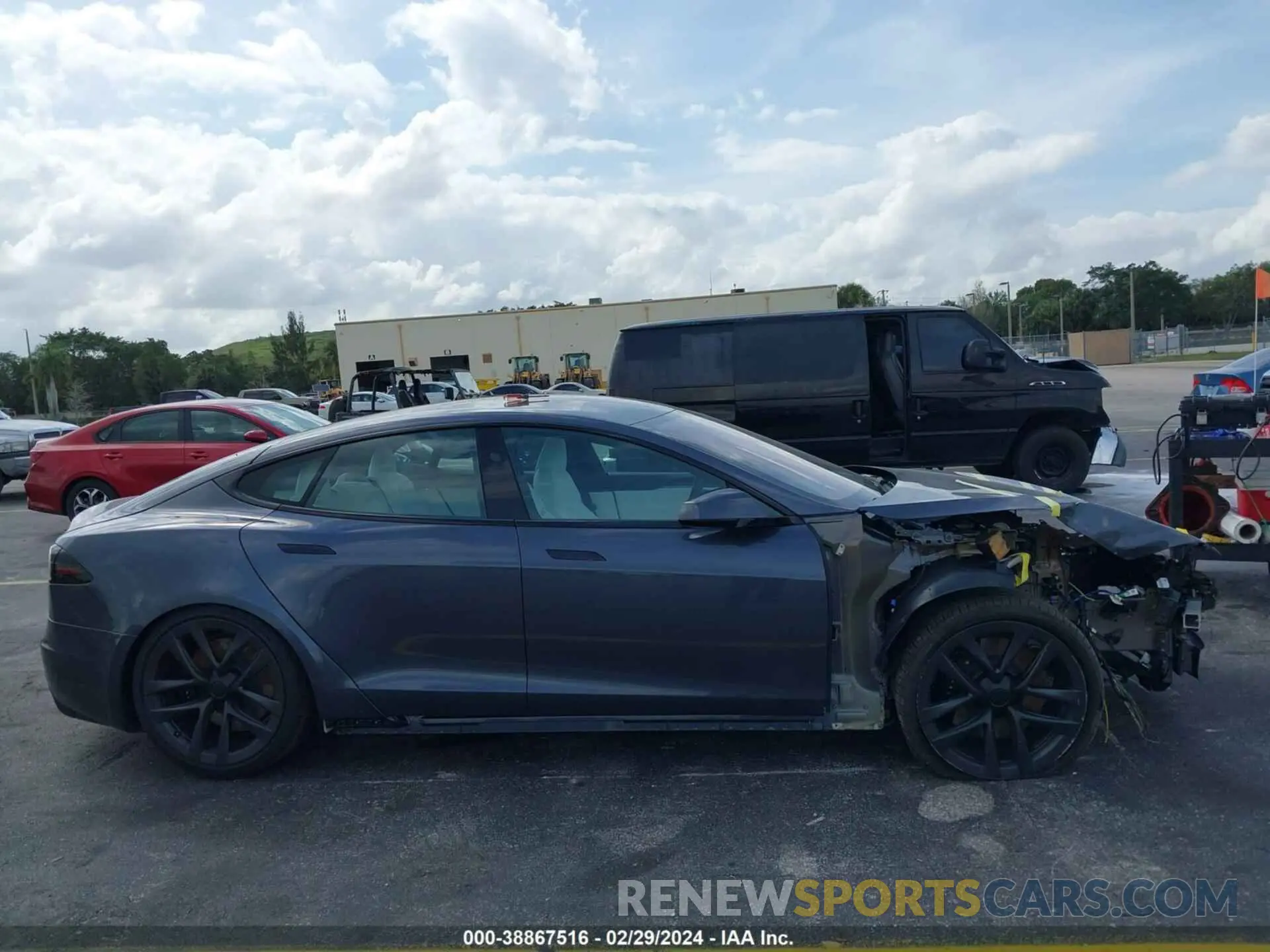 12 Photograph of a damaged car 5YJSA1E54PF521783 TESLA MODEL S 2023