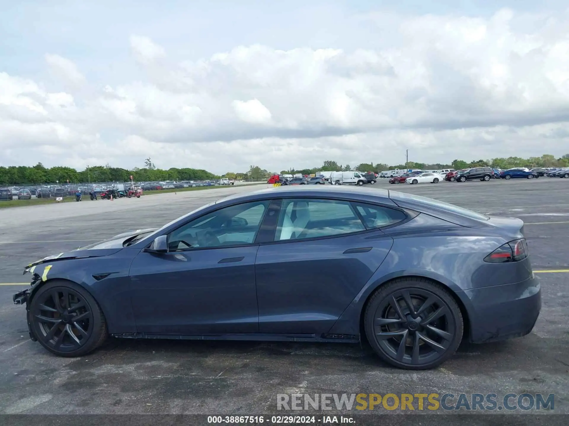 13 Photograph of a damaged car 5YJSA1E54PF521783 TESLA MODEL S 2023