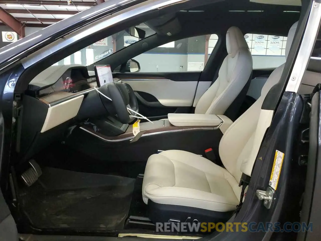 7 Photograph of a damaged car 5YJSA1E55PF499423 TESLA MODEL S 2023