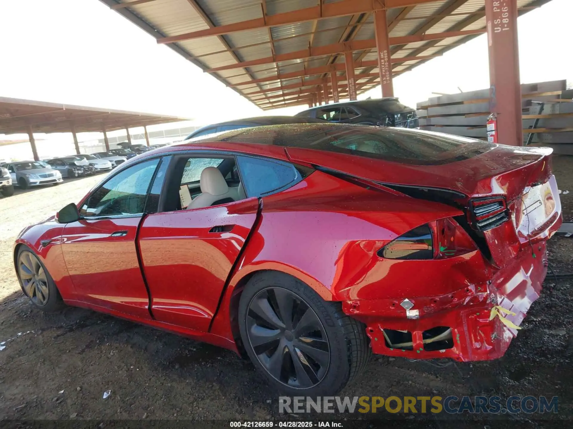 19 Photograph of a damaged car 5YJSA1E55PF513708 TESLA MODEL S 2023