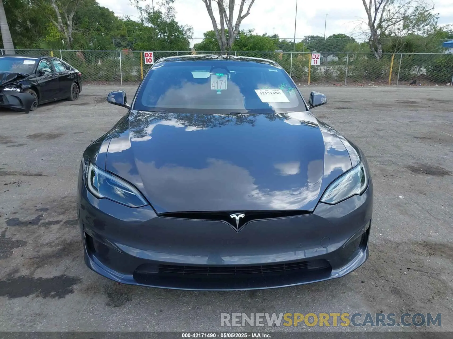 12 Photograph of a damaged car 5YJSA1E59PF502274 TESLA MODEL S 2023