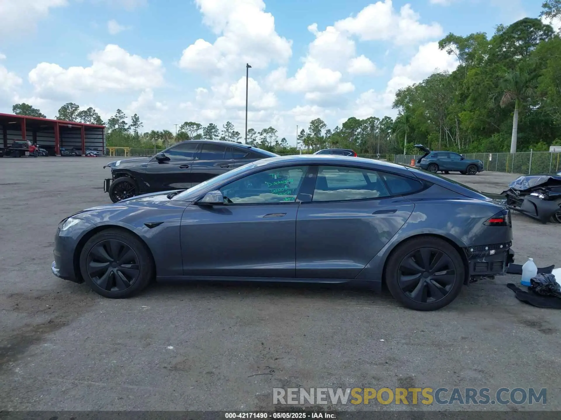 14 Photograph of a damaged car 5YJSA1E59PF502274 TESLA MODEL S 2023