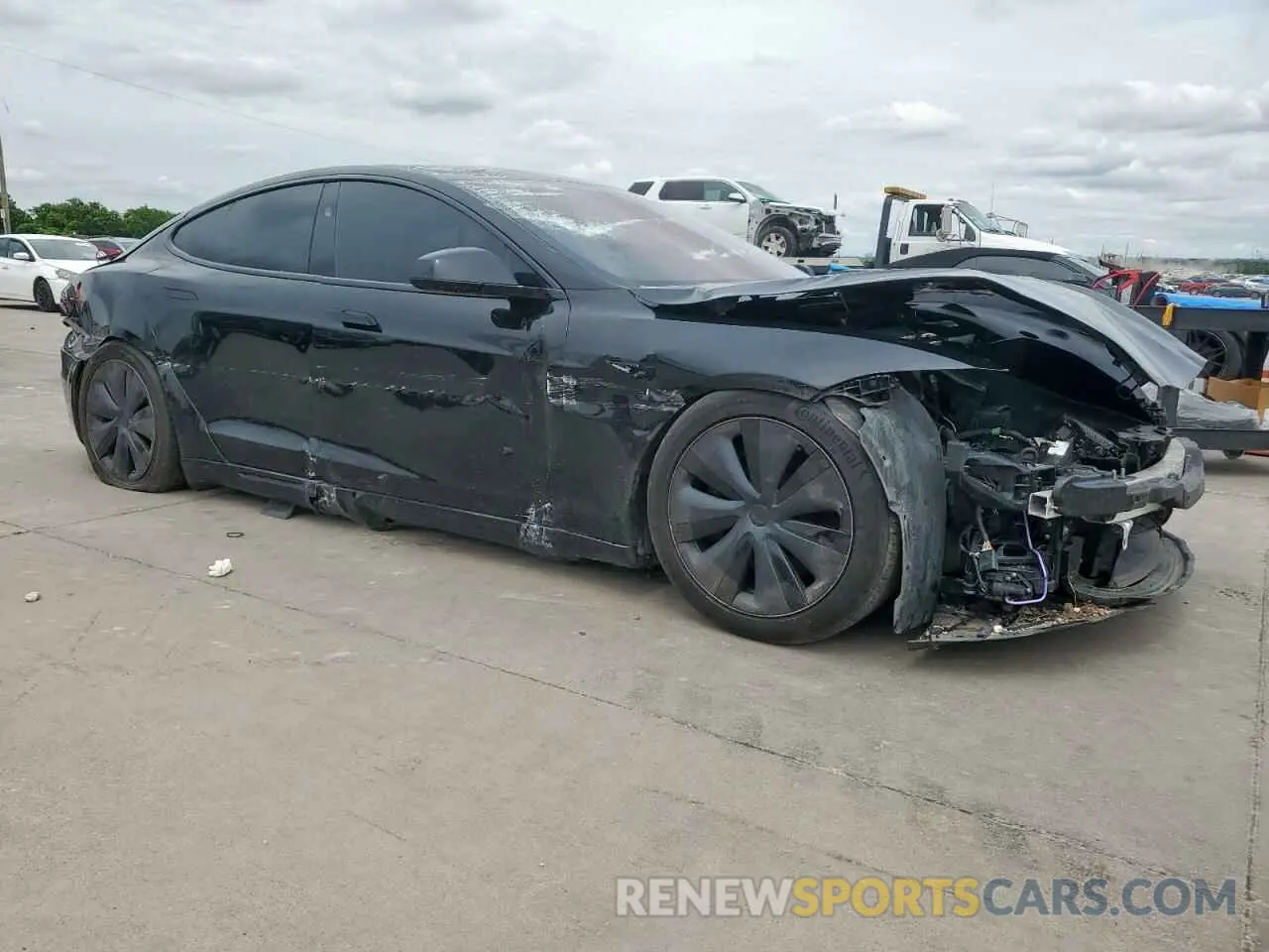 4 Photograph of a damaged car 5YJSA1E59PF512318 TESLA MODEL S 2023