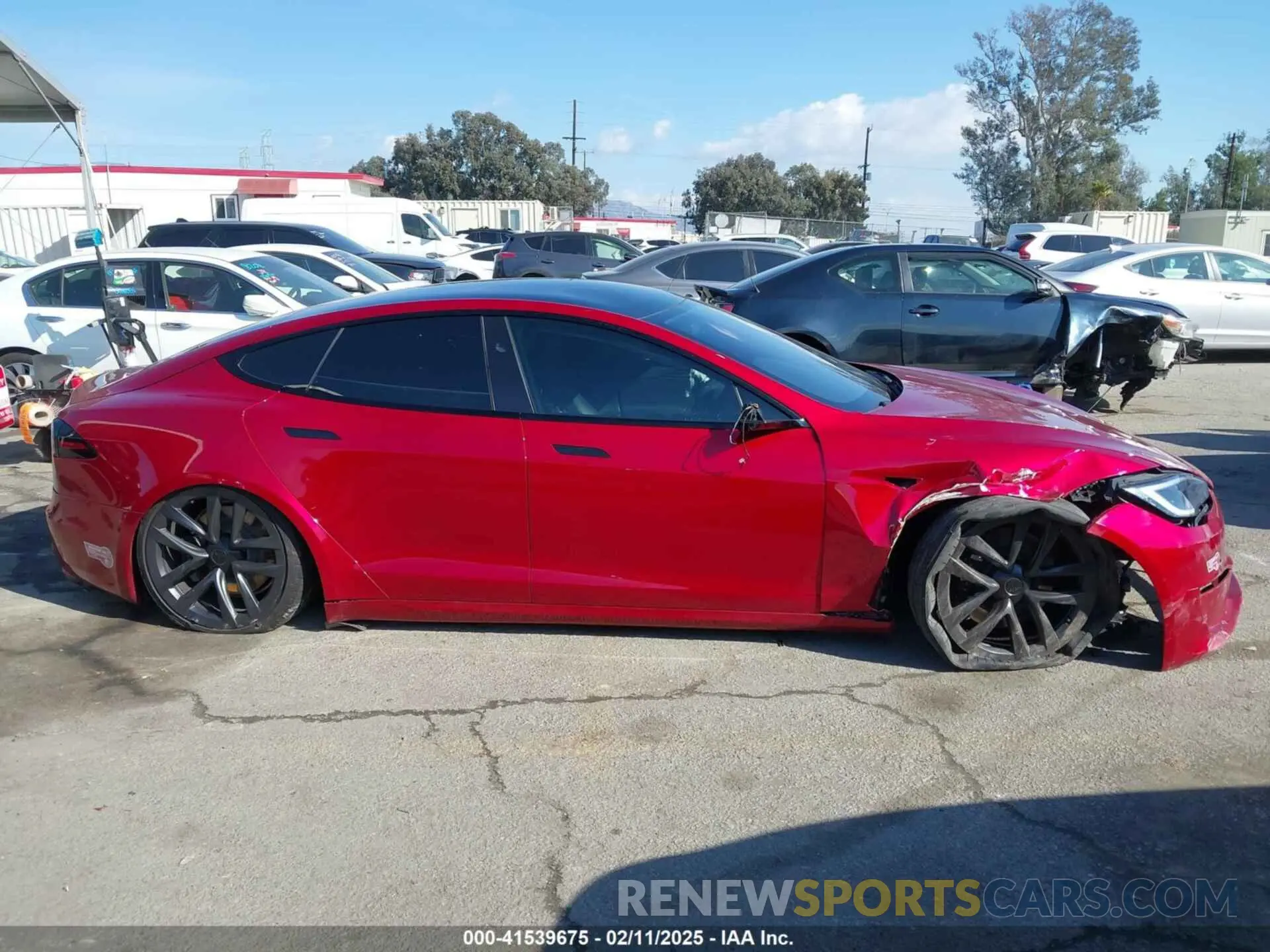 14 Photograph of a damaged car 5YJSA1E5XPF519780 TESLA MODEL S 2023
