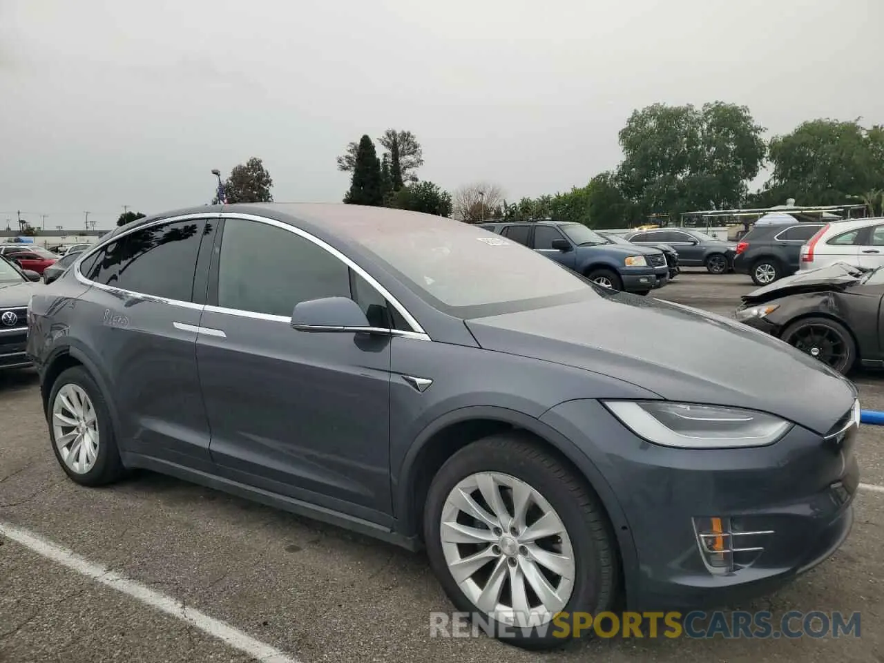 4 Photograph of a damaged car 5YJXCBE25LF305575 TESLA MODEL X 2020