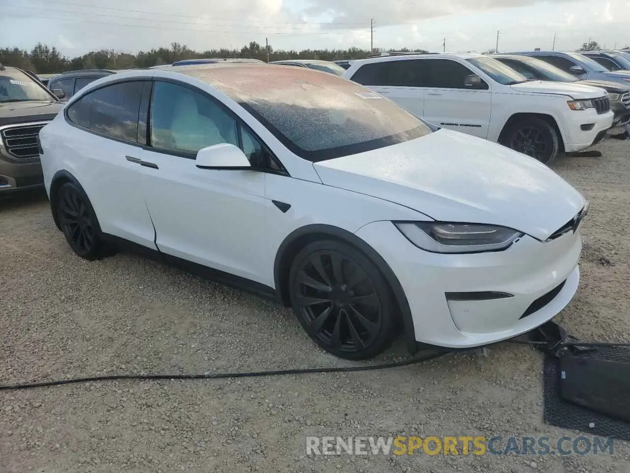 4 Photograph of a damaged car 7SAXCBE66NF344703 TESLA MODEL X 2022