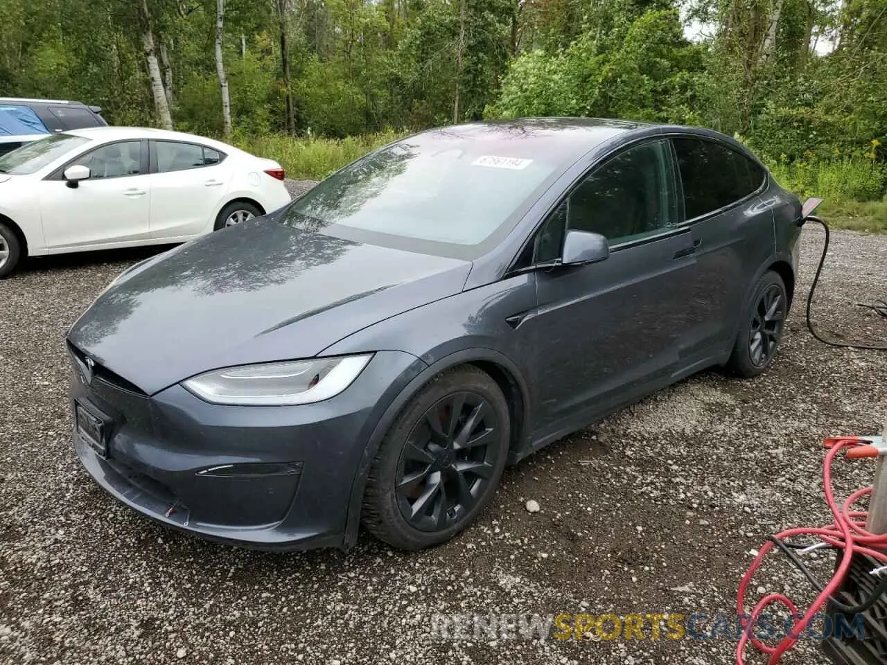1 Photograph of a damaged car 7SAXCBE50PF374581 TESLA MODEL X 2023