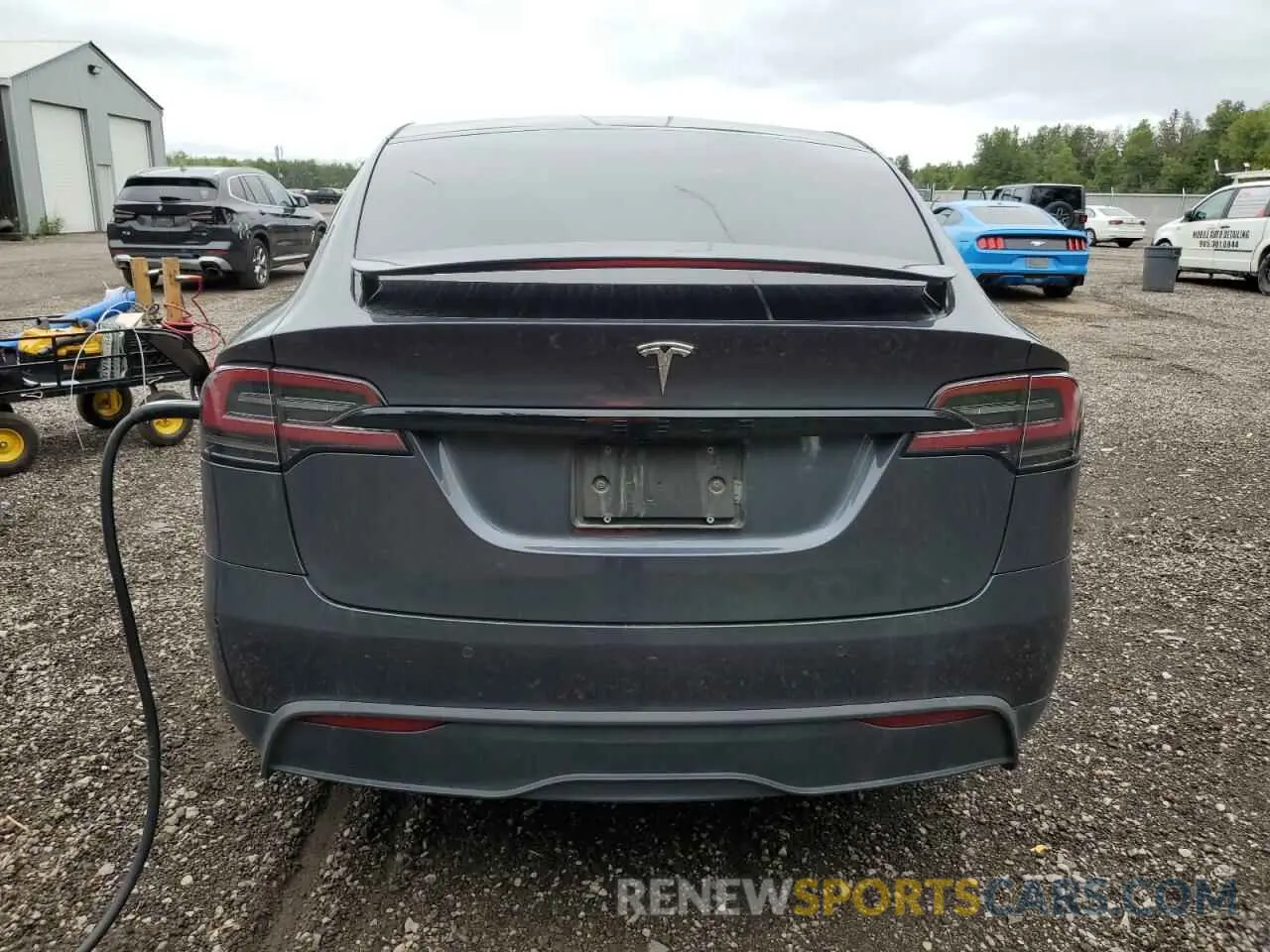 6 Photograph of a damaged car 7SAXCBE50PF374581 TESLA MODEL X 2023