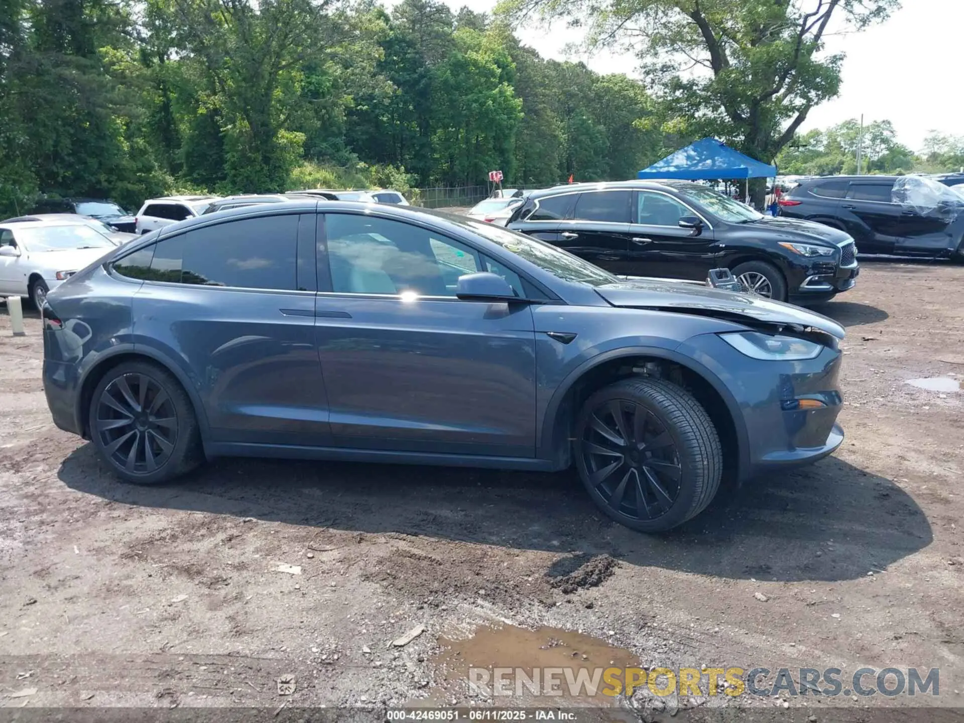 13 Photograph of a damaged car 7SAXCBE55PF411222 TESLA MODEL X 2023