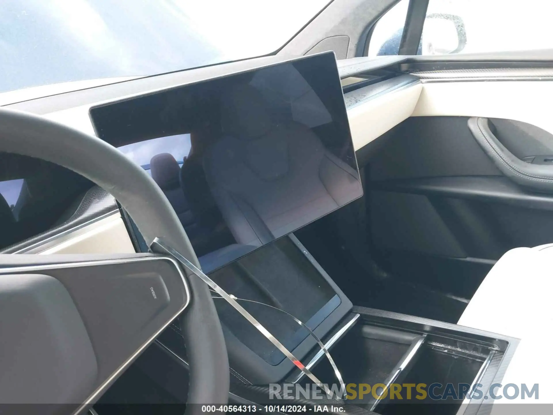 18 Photograph of a damaged car 7SAXCBE61PF418340 TESLA MODEL X 2023