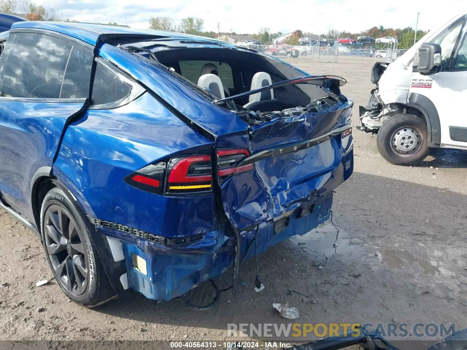 24 Photograph of a damaged car 7SAXCBE61PF418340 TESLA MODEL X 2023