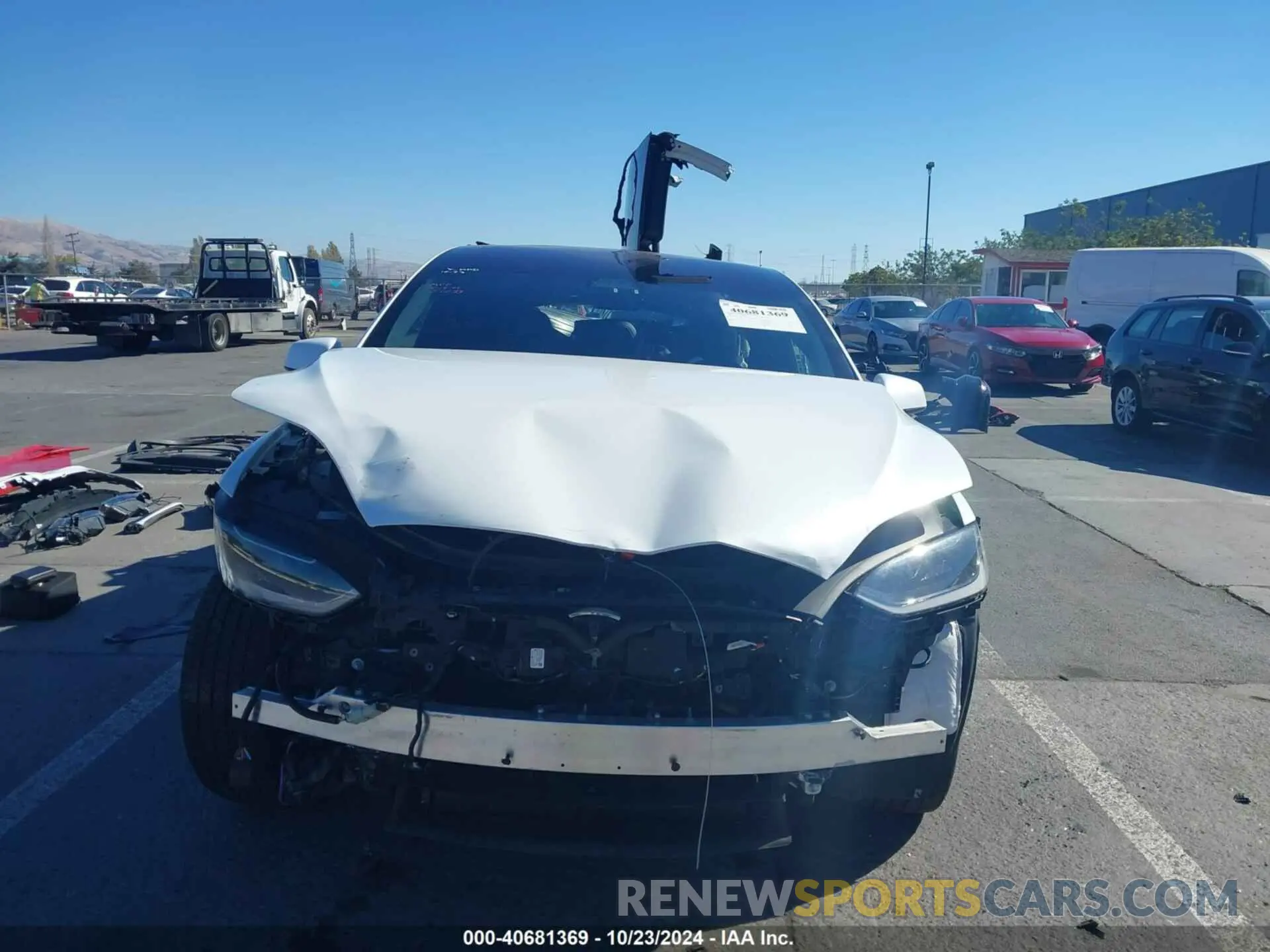 12 Photograph of a damaged car 7SAXCBE69PF410115 TESLA MODEL X 2023