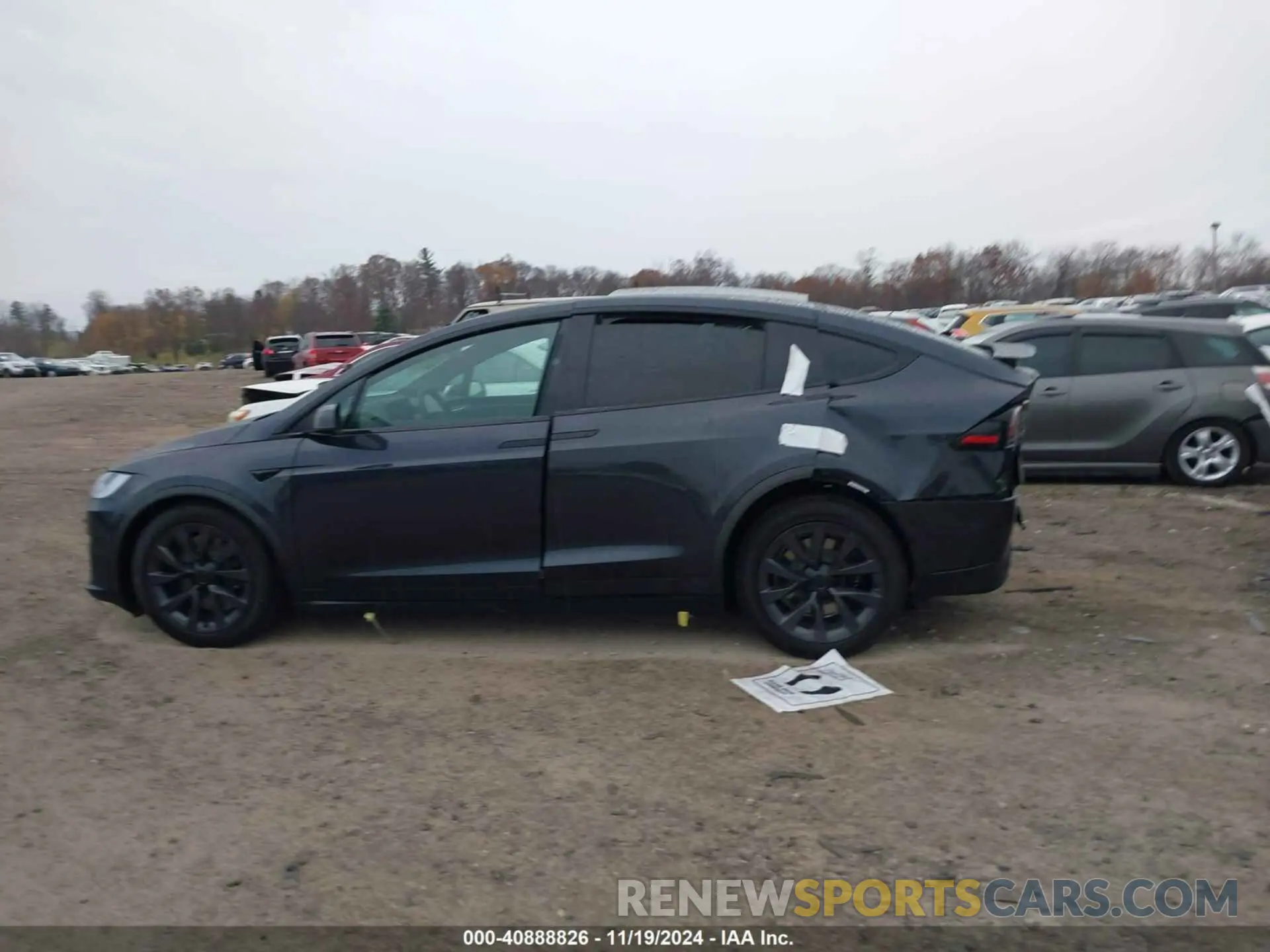 14 Photograph of a damaged car 7SAXCBE58RF459073 TESLA MODEL X 2024