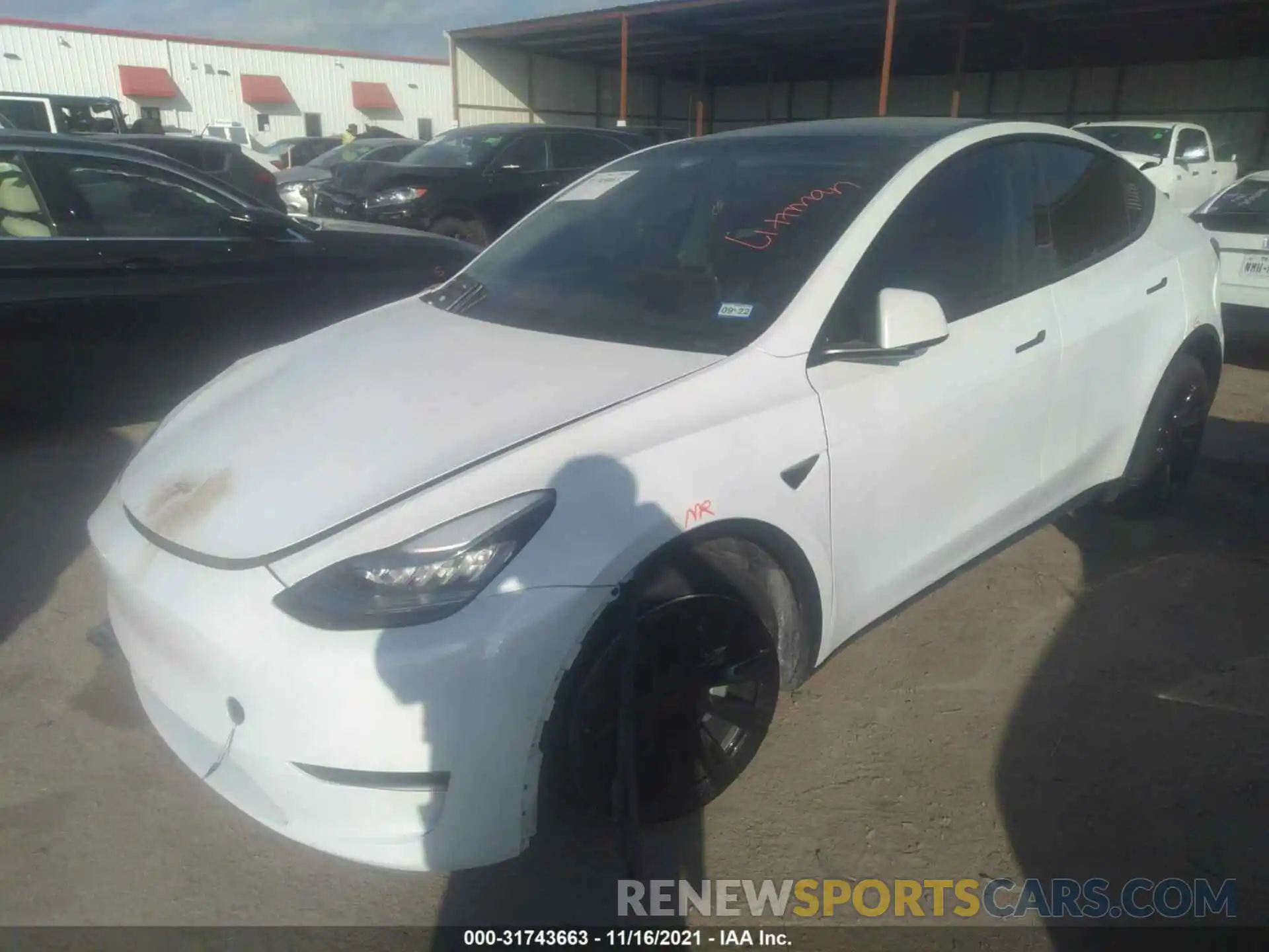 2 Photograph of a damaged car 5YJYGDEE0LF012813 TESLA MODEL Y 2020