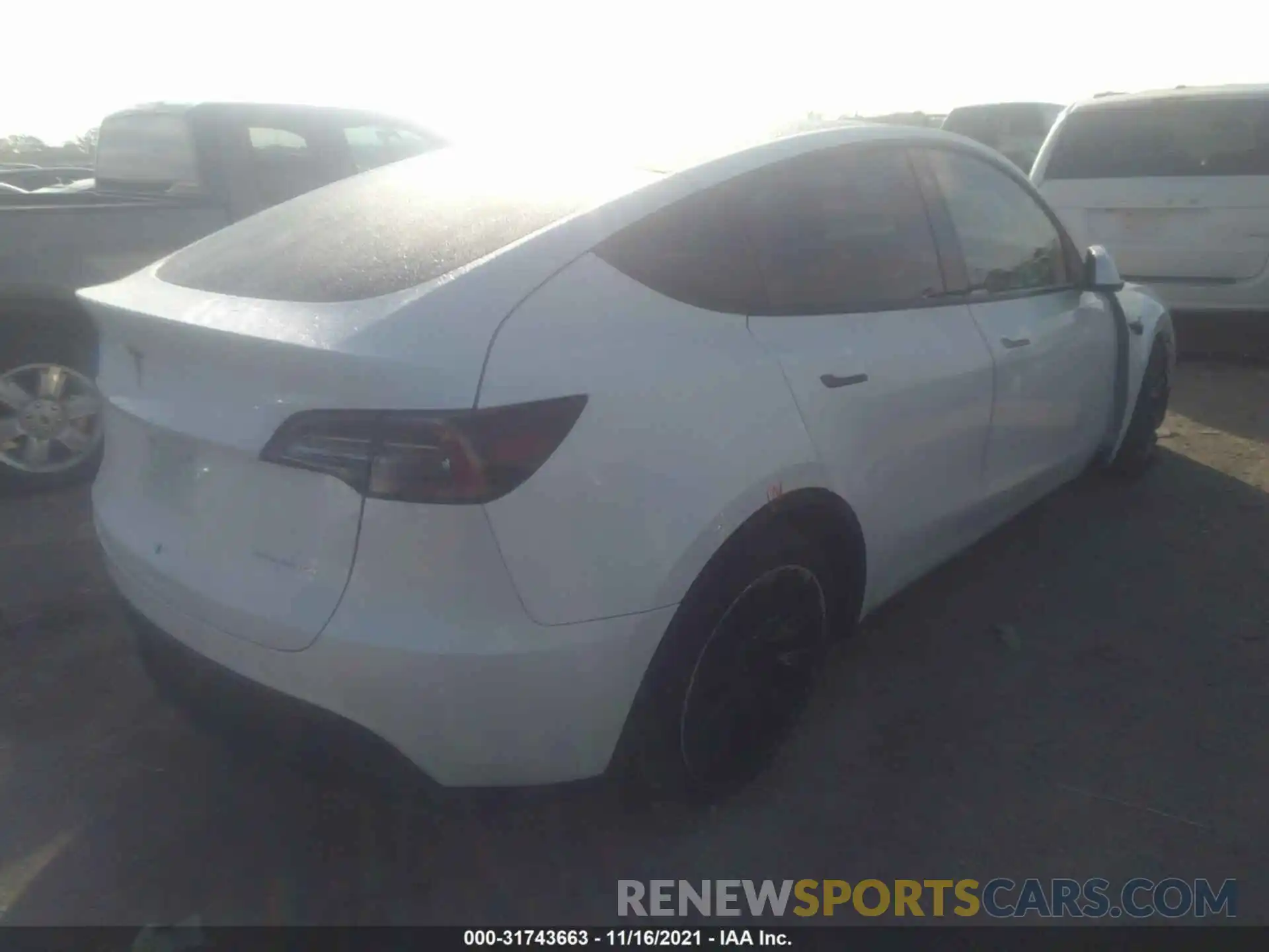 4 Photograph of a damaged car 5YJYGDEE0LF012813 TESLA MODEL Y 2020